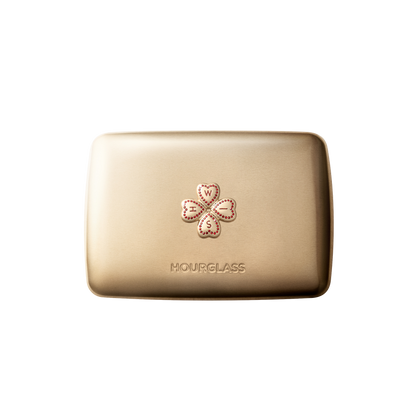 Hourglass Wish 2026 gold case with four-leaf clover charm